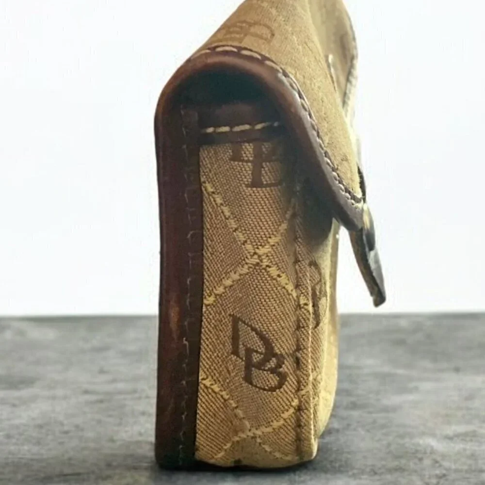 Dooney & Bourke Brown Wristlet Clutch Wallet Leather Wrist Strap Signature Logo
